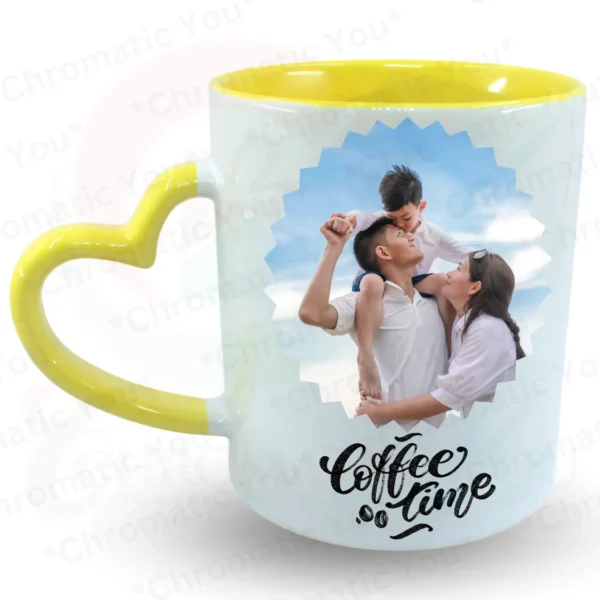 Ceramic mug with a heart-shaped handle and colorful inner design.
