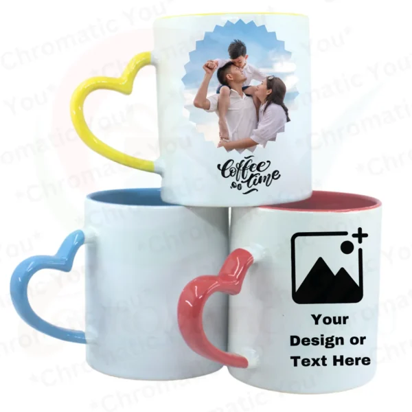 Personalized ceramic mug with heart-shaped handle and colored interior.